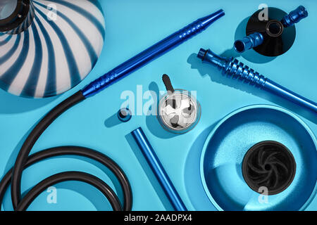 Top view of Hookah parts on light blue background Stock Photo