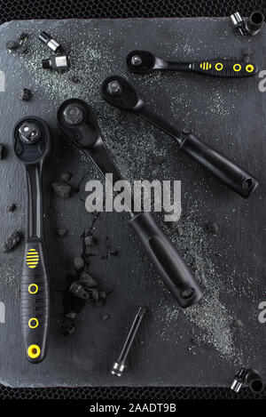 Professional ratchet tools placed on a black background, Wrench Tool for the work in the workshop. Stock Photo