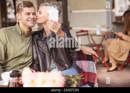 Pretty woman being happy with her man Stock Photo