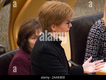 Edinburgh, UK. 21st Nov, 2019. Pictured: (left) Jeane Freeman MSP - Cabinet Minister for Health; (right) Nicola Sturgeon MSP - First Minister of Scotland and Leader of the Scottish National Party (SNP). Scenes from the weekly session of First Ministers Questions in the Scottish Parliament. Credit: Colin Fisher/Alamy Live News Stock Photo