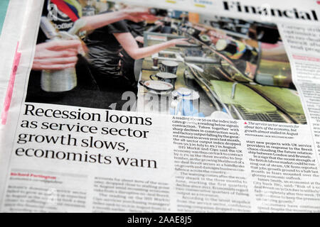 'Recession looms as service sector growth slows, economists warn' newspaper headline in Guardian financial section inside pages London  UK Stock Photo