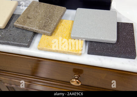 samples of granite tiles in the store on the table Stock Photo