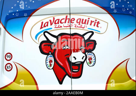 Logo 'La vache qui rit' ( the laughing cow) on the rear door of a van ( Morocco) Stock Photo
