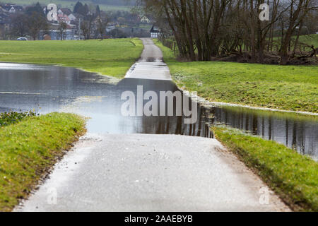 flooded biking way, near Oberweser, Weser Uplands, Weserbergland, Hesse, Germany Stock Photo