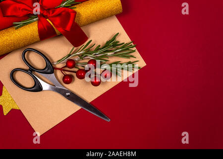 DIY homemade and handmade Christmas wrapping. Tools and decorations for gifts and presents. New Year concept. Top view. Stock Photo