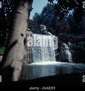 Vintage September 1972 photograph, waterfall at Disneyland theme park in Anaheim, California. SOURCE: ORIGINAL 35mm TRANSPARENCY Stock Photo