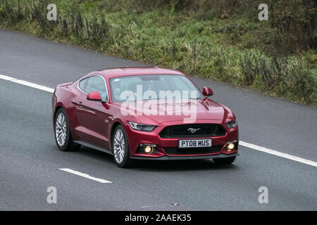 Blurred moving car PT08MUS Shelby FORD MUSTANG GT AUTO American muscle car Slow camera shutter speed vehicle movement Stock Photo