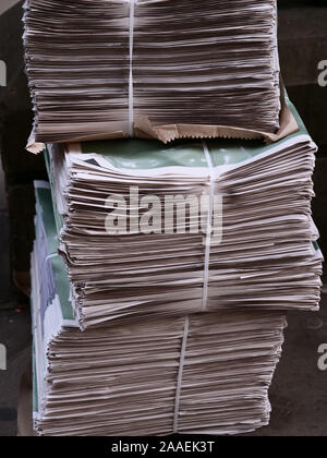 Pile of newspapers close up. Stock Photo