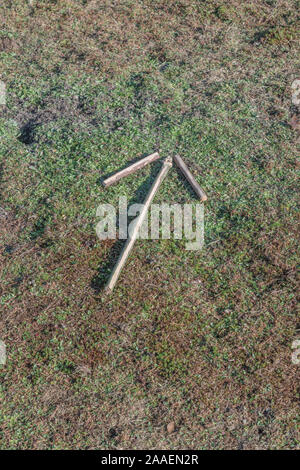 Survival skills concept. Method of signalling 'proceed this way ...