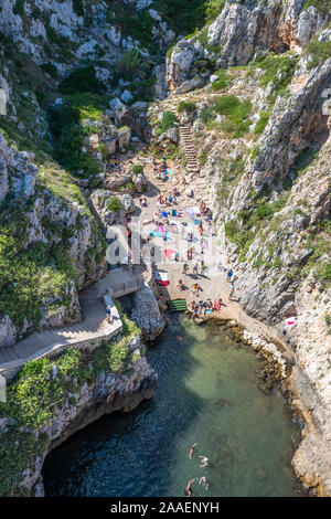 Aerial view of public beach (Il Ciolo) from road bridge at Channel Ciolo near Gagliano del Capo on Adriatic Coast of Apulia (Puglia) in Southern Italy Stock Photo