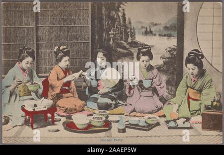 Illustrated postcard of a group of young Japanese women in traditional clothing, kneeling on a tatami floor having dinner, with bowls of rice on the ground in front of them and bamboo and paper screens behind them, Japan, published by Ueda, 1920. From the New York Public Library. () Stock Photo