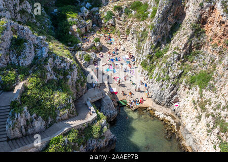 Aerial view of public beach (Il Ciolo) from road bridge at Channel Ciolo near Gagliano del Capo on Adriatic Coast of Apulia (Puglia) in Southern Italy Stock Photo