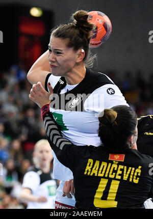 Stuttgart, Germany. 21st Nov, 2019. Handball, women: international, Germany - Montenegro: Germany's Emily Bölk (o) plays against Montenegro's Jovanka Radicevic. Credit: Thomas Kienzle/dpa/Alamy Live News Stock Photo