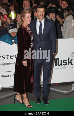 Bear Grylls and his wife Shara arrive at the Empire Cinema in Leicester Square, London, to attend the Tusk Conservation Awards. Stock Photo