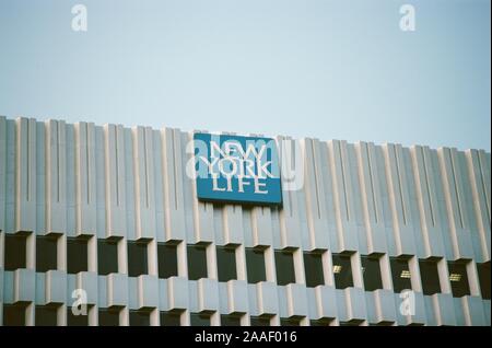 Close-up of sign with logo on New York Life building in downtown Los Angeles, California, October 24, 2018. () Stock Photo