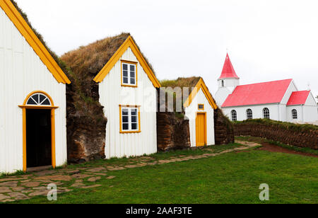 Glaumbaer turf farm house and approaching storm Skagafjordur in northern Iceland Stock Photo