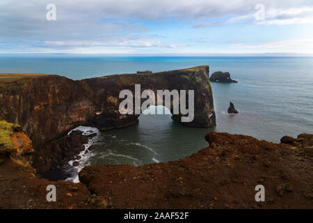 Dyrholaey arch on the coast of Reynisfjara near Vik, Iceland Stock Photo