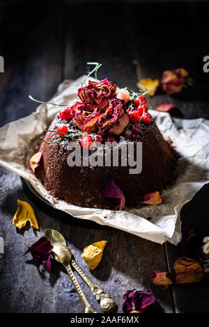 homemade chocolate cake sweet dessert low fat food.old table.dried flowers Stock Photo