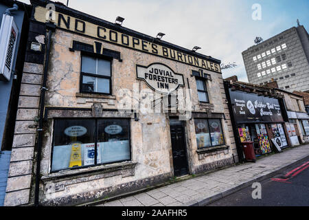 Rows of shops and closed down businesses, such as pubs and independently run stores just outside the city centre of Hanley, Stoke on Trent, derelict Stock Photo