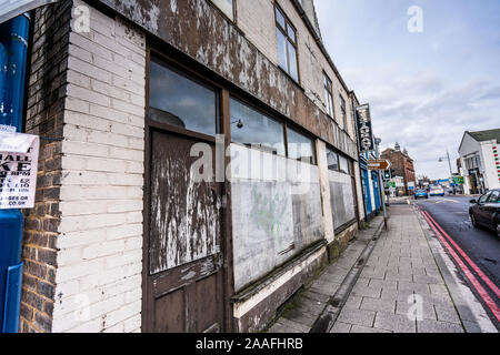 Rows of shops and closed down businesses, such as pubs and independently run stores just outside the city centre of Hanley, Stoke on Trent, derelict Stock Photo