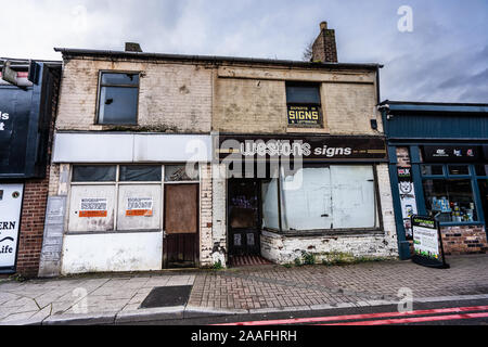 Rows of shops and closed down businesses, such as pubs and independently run stores just outside the city centre of Hanley, Stoke on Trent, derelict Stock Photo