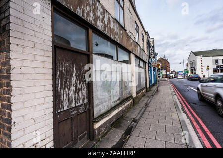 Rows of shops and closed down businesses, such as pubs and independently run stores just outside the city centre of Hanley, Stoke on Trent, derelict Stock Photo