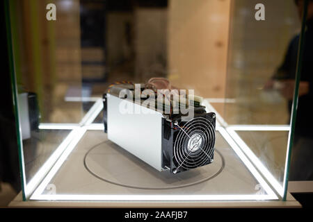 Cryptocurrency mining equipment - ASIC - application specific integrated circuit on farm stand at expo Stock Photo