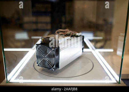 Cryptocurrency mining equipment - ASIC - application specific integrated circuit on farm stand at expo Stock Photo