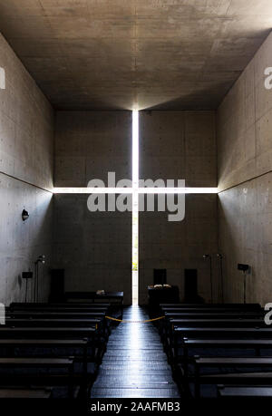 OSAKA, JAPAN - NOVEMBER 11, 2019: Interior of Church of the light - Ibaraki Kasugaoka Church. Designed by Tadao Ando. Stock Photo