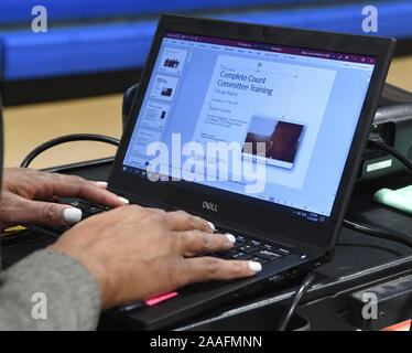 Racine, Wisconsin, USA. 21st Nov, 2019. ALEXIA KNOX from the U.S. Census Bureau in Chicago prepares her presentation for 'Complete Count 2020,'' an informational session about the 2020 Census, held for community agency representatives Thursday November 21, 2019 at the Cesar Chavez Community Center in Racine, Wisconsin. Aims of the session were to spread awareness of the census and its importance, in hopes of recruiting census workers and in hopes of encouraging participation in the census itself. Credit: Mark Hertzberg/ZUMA Wire/Alamy Live News Stock Photo