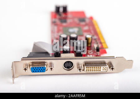 Analog and digital connector mounted in the graphics card. Old graphics card for PC. Light background. Stock Photo