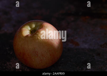 Fuji apple on dark background Stock Photo