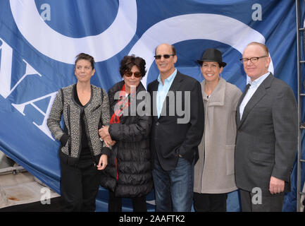 LOS ANGELES, CA. December 11, 2015: Tina Sinatra (centre), daughter of Frank Sinatra, & his granddaughters AJ Lambert (left) & Amanda Erlinger with Bruce Resnikoff, senior VP of Universal Music Group, & Steve Barnett (right), chairman & CEO of Capitol Records,at the ceremony atop the Capitol Records Building in Hollywood to raise a 100th birthday flag in honor of singer Frank Sinatra who was born 100 years ago on 12th December.  © 2015 Paul Smith / Featureflash Stock Photo