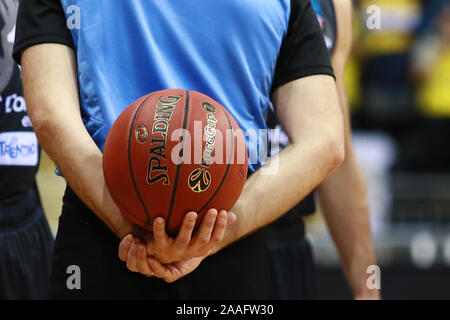 Oldenburg, Germany, November 20, 2019: a referee holds the official Eurocup game ball during the a Eurocup basketball match Stock Photo