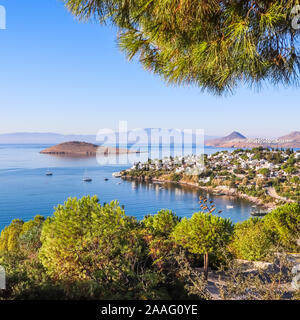 Aegean coast with marvelous blue water, rich nature, islands, mountains and small white houses Stock Photo