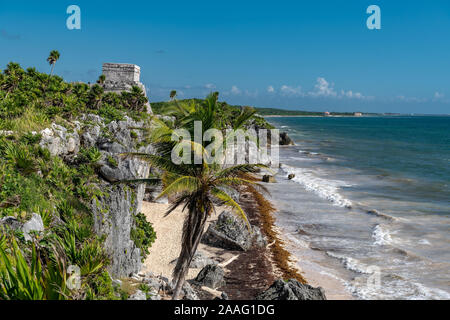 Beautiful beach in Tulum Mexico, Mayan ruins on top of the cliff. Stock Photo