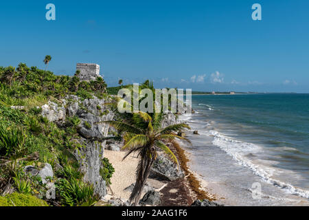 Beautiful beach in Tulum Mexico, Mayan ruins on top of the cliff. Stock Photo