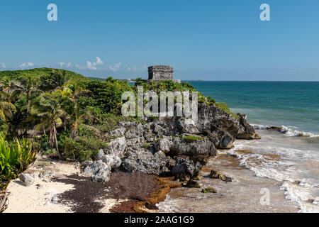 Beautiful beach in Tulum Mexico, Mayan ruins on top of the cliff. Stock Photo