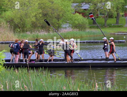 New Preston, CT USA. May 2016. Crew members docking in action for the next boat to hit the water. Stock Photo