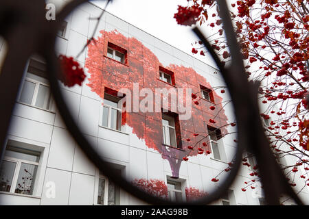 Novosibirsk, Russia - 10.26.2019: Poster or graffiti in the form of a big red heart on a white wall of a building on the street Stock Photo