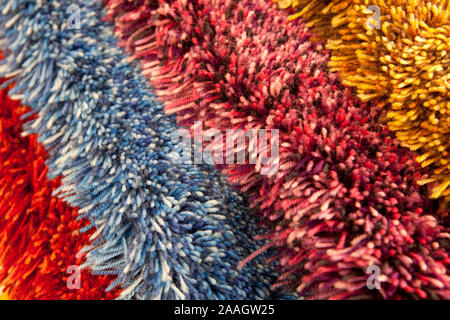 artificial fur carpets of different colors Stock Photo