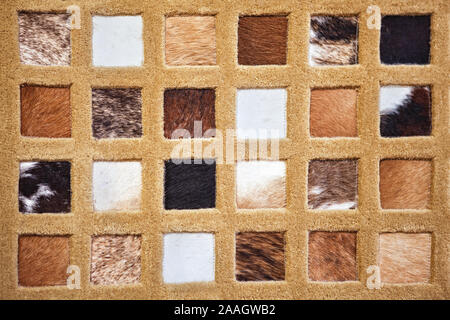 samples of artificial fur carpets of different colors Stock Photo