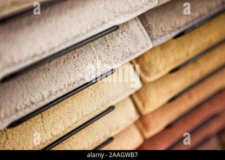 samples of artificial fur carpets of different colors Stock Photo