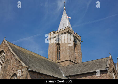 The Town Church is also known as the Parish Church of St Peter Port in Guernsey during Sunny day with blue sky. Stock Photo