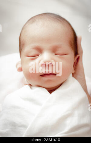 Portrait of cute Asian baby, concept create newborn, selective focus at the eyes. Stock Photo