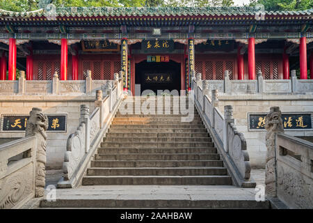 Huashan, China -  August 2019 : Wide stone concrete stairs leading to the Buddhist temple at the foot of Huashan mountain, Xian, Shaanxi Province Stock Photo