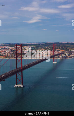 Ponte 25 de Abril is a suspension bridge connecting the city of Lisbon, to the Almada Stock Photo