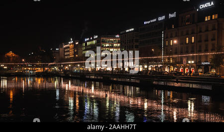 Geneva, Switzerland - November 24, 2016: Cityscape with illuminated houses in central district of Geneva city at night Stock Photo