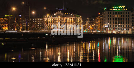 Geneva, Switzerland - November 24, 2016: Geneva cityscape with illuminated facades in central district at night Stock Photo