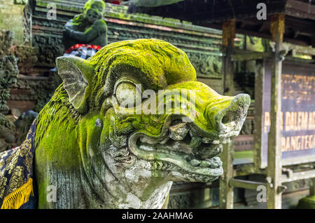 Old statue in Hindu temple in Sacred Monkey Forest, Ubud, Bali, Indonesia Stock Photo